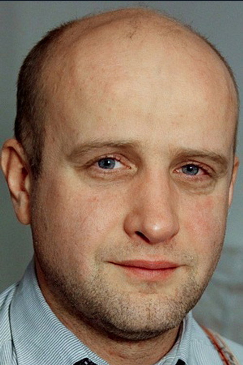 Виталий Коваленко jako interrogator w obsadzie Biały kruk